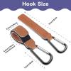 imageRUVALINO Leather Stroller Hooks for Diaper Bag and Stroller Organizer  Stroller Strap with Large Carabiner Clip for Shopping Bags  Accessories for Wheelchair Shopping and Pet Carts Brown 2 Pack